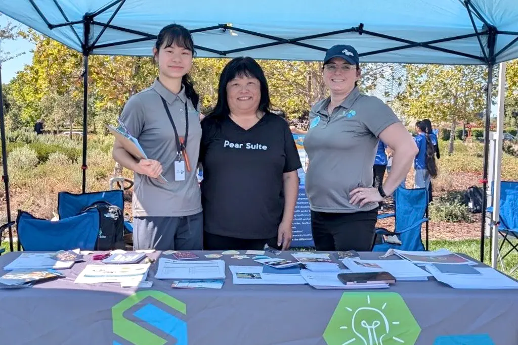 Pear Suite’s Maternal Health Director May Ly (center) is flanked by Common Good Community’s Executive Director Becky Honig (right) and Community Health Work Program Manager Chi Qian Chen (Left)"